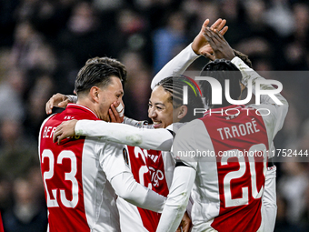 AFC Ajax Amsterdam forward Steven Berghuis and AFC Ajax Amsterdam midfielder Kian Fitz-Jim celebrate a goal during the match between Ajax an...