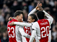 AFC Ajax Amsterdam forward Steven Berghuis and AFC Ajax Amsterdam midfielder Kian Fitz-Jim celebrate a goal during the match between Ajax an...