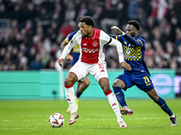 AFC Ajax Amsterdam forward Chuba Akpom and Maccabi Tel Aviv midfielder Issouf Sissokho play during the match between Ajax and Maccabi Tel Av...