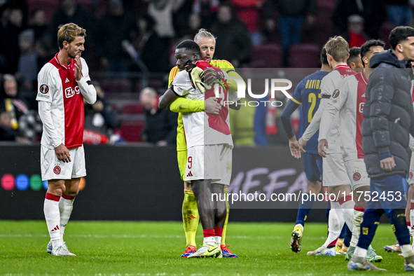 AFC Ajax Amsterdam forward Brian Brobbey and AFC Ajax Amsterdam goalkeeper Remko Pasveer participate in the match between Ajax and Maccabi T...