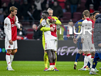 AFC Ajax Amsterdam forward Brian Brobbey and AFC Ajax Amsterdam goalkeeper Remko Pasveer participate in the match between Ajax and Maccabi T...