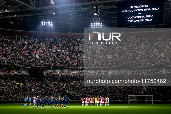 A one-minute silence takes place for the victims of the floods in Valencia during the match between Ajax and Maccabi Tel Aviv at the Johan C...