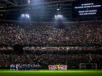 A one-minute silence takes place for the victims of the floods in Valencia during the match between Ajax and Maccabi Tel Aviv at the Johan C...