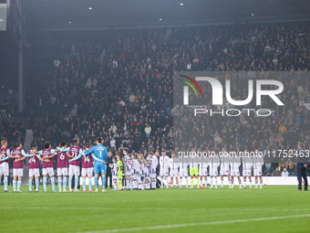 The teams and officials pay their respects to the fallen during the Sky Bet Championship match between West Bromwich Albion and Burnley at T...