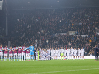 The teams and officials pay their respects to the fallen during the Sky Bet Championship match between West Bromwich Albion and Burnley at T...