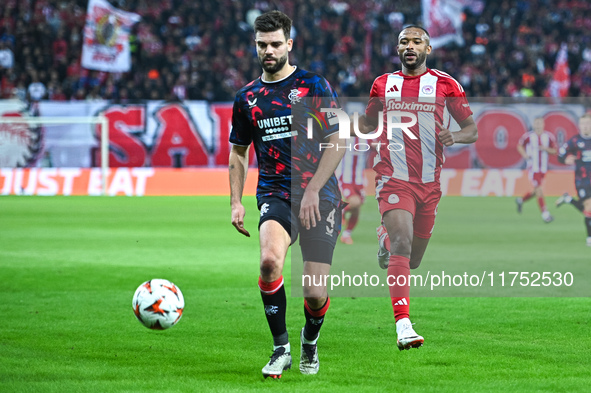 Robin Propper of Rangers competes with Ayoub El Kaabi of Olympiacos FC during the Europa League, Matchday 4 match between Olympiacos FC and...