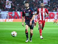 Robin Propper of Rangers competes with Ayoub El Kaabi of Olympiacos FC during the Europa League, Matchday 4 match between Olympiacos FC and...