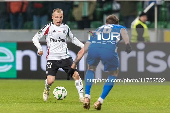 Patryk Kun , Vladislav Kalinin  during UEFA Conference League match Legia Warsaw vs Dinamo Minsk in Warsaw Poland on 7 November 2024. 