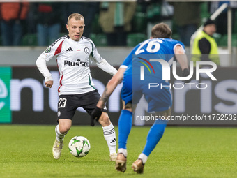 Patryk Kun , Vladislav Kalinin  during UEFA Conference League match Legia Warsaw vs Dinamo Minsk in Warsaw Poland on 7 November 2024. (