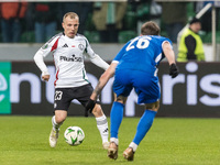 Patryk Kun , Vladislav Kalinin  during UEFA Conference League match Legia Warsaw vs Dinamo Minsk in Warsaw Poland on 7 November 2024. (