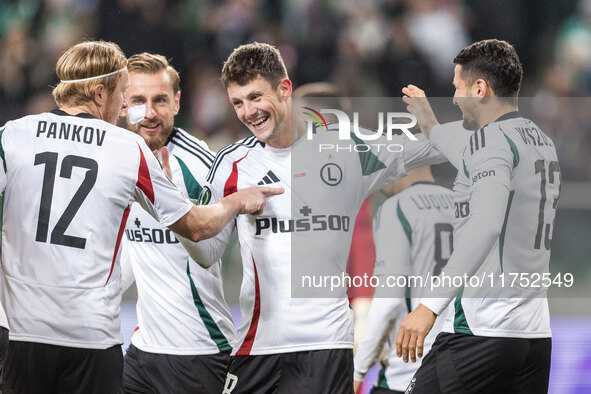 Radovan Pankov , Rafal Augustyniak , Mark Gual , Pawel Wszolek , goal celebration during UEFA Conference League match Legia Warsaw vs Dinamo...