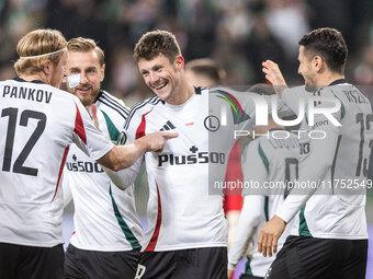 Radovan Pankov , Rafal Augustyniak , Mark Gual , Pawel Wszolek , goal celebration during UEFA Conference League match Legia Warsaw vs Dinamo...