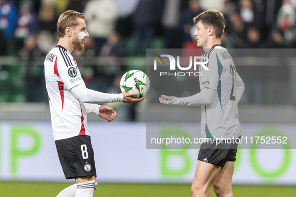 Rafal Augustyniak , Mark Gual  during UEFA Conference League match Legia Warsaw vs Dinamo Minsk in Warsaw Poland on 7 November 2024. 