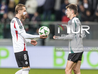 Rafal Augustyniak , Mark Gual  during UEFA Conference League match Legia Warsaw vs Dinamo Minsk in Warsaw Poland on 7 November 2024. (