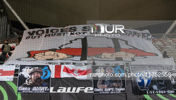 Banners presented by Dinamo fans during UEFA Conference League match Legia Warsaw vs Dinamo Minsk in Warsaw Poland on 7 November 2024. 