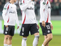 Kacper Chodyna , Rafal Augustyniak , Pawel Wszolek  during UEFA Conference League match Legia Warsaw vs Dinamo Minsk in Warsaw Poland on 7 N...