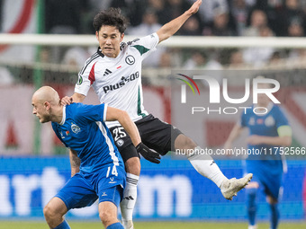 Pavel Sedko , Ryoya Morishita  during UEFA Conference League match Legia Warsaw vs Dinamo Minsk in Warsaw Poland on 7 November 2024. (