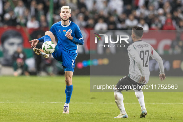 Vadim Pigas , Luquinhas  during UEFA Conference League match Legia Warsaw vs Dinamo Minsk in Warsaw Poland on 7 November 2024. 