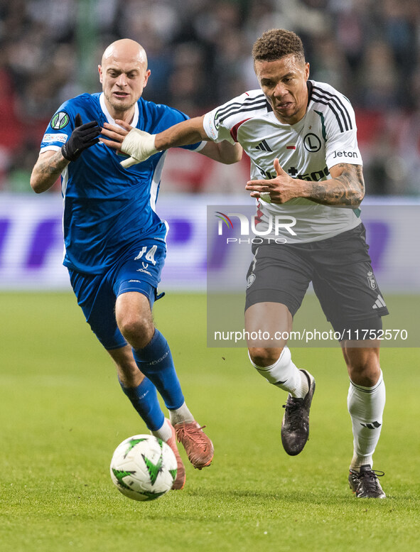 Pavel Sedko , Steve Kapuadi  during UEFA Conference League match Legia Warsaw vs Dinamo Minsk in Warsaw Poland on 7 November 2024. 