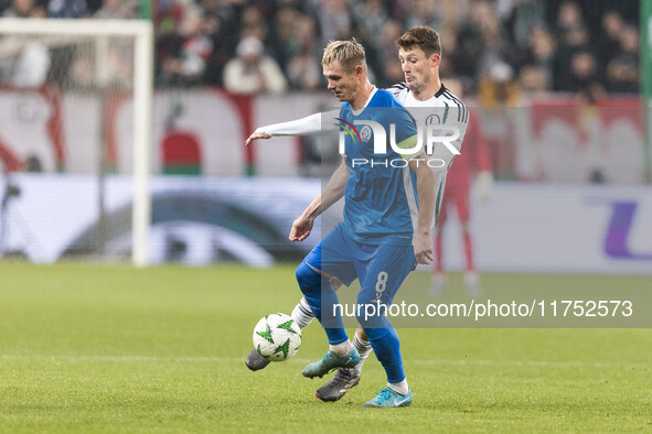 Aleksandr Selyava , Mark Gual  during UEFA Conference League match Legia Warsaw vs Dinamo Minsk in Warsaw Poland on 7 November 2024. 