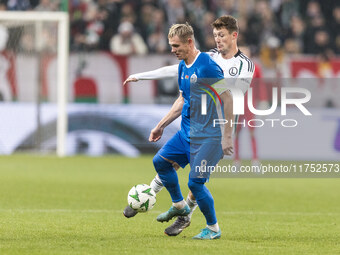 Aleksandr Selyava , Mark Gual  during UEFA Conference League match Legia Warsaw vs Dinamo Minsk in Warsaw Poland on 7 November 2024. (