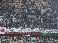 Legia fans present a banner insulting Aleksandr Lukashenko during UEFA Conference League match Legia Warsaw vs Dinamo Minsk in Warsaw Poland...