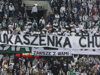 Legia fans present a banner insulting Aleksandr Lukashenko during UEFA Conference League match Legia Warsaw vs Dinamo Minsk in Warsaw Poland...