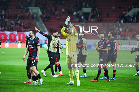 Players of Rangers celebrate with fans during the Europa League, Matchday 4 match between Olympiacos FC and Rangers at Georgios Karaiskakis...