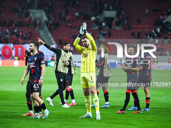 Players of Rangers celebrate with fans during the Europa League, Matchday 4 match between Olympiacos FC and Rangers at Georgios Karaiskakis...