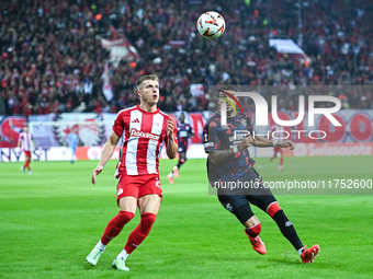 Costinha of Olympiacos FC competes with Jefte of Rangers during the Europa League, Matchday 4 match between Olympiacos FC and Rangers at Geo...