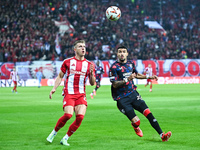 Costinha of Olympiacos FC competes with Jefte of Rangers during the Europa League, Matchday 4 match between Olympiacos FC and Rangers at Geo...