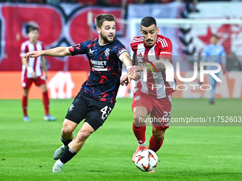 Nicolas Raskin of Rangers competes with Chiquinho of Olympiacos FC during the Europa League, Matchday 4 match between Olympiacos FC and Rang...