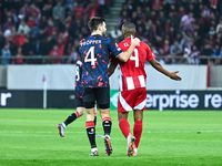 Ayoub El Kaabi of Olympiacos FC competes with a player from Rangers during the Europa League, Matchday 4 match between Olympiacos FC and Ran...