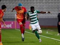 In Ta' Qali, Malta, on November 7, 2024, Franklin Sasere of Floriana is closely challenged by Alessandro Coppola of Birkirkara during the Ma...