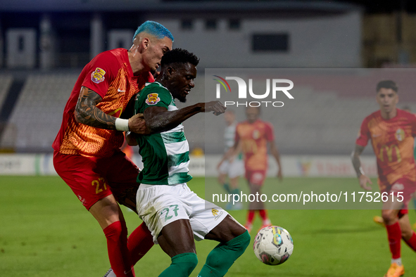 In Ta' Qali, Malta, on November 7, 2024, Franklin Sasere of Floriana is closely marked by Alessandro Coppola of Birkirkara during the Malta...