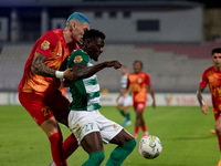 In Ta' Qali, Malta, on November 7, 2024, Franklin Sasere of Floriana is closely marked by Alessandro Coppola of Birkirkara during the Malta...