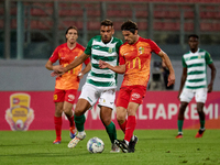 In Ta' Qali, Malta, on November 7, 2024, Jake Grech of Floriana vies for the ball with Pablo Gaitan of Birkirkara during the Malta 360 Sport...