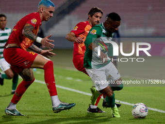 In Ta' Qali, Malta, on November 7, 2024, Kemar Reid of Floriana is closely followed by Alessandro Coppola of Birkirkara during the Malta 360...