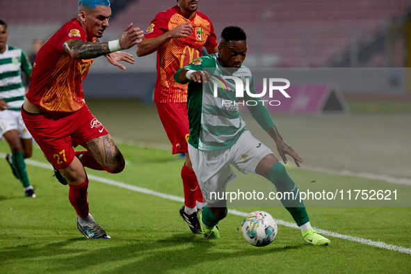 In Ta' Qali, Malta, on November 7, 2024, Kemar Reid of Floriana is closely followed by Alessandro Coppola of Birkirkara during the Malta 360...