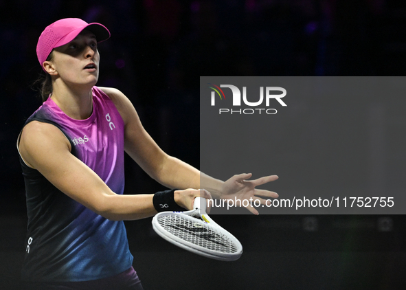 RIYADH, SAUDI ARABIA - NOVEMBER 07: Iga Swiatek of Poland during her match against Daria Kasatkina, on Day 6 of the 2024 WTA Finals, part of...