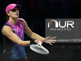 RIYADH, SAUDI ARABIA - NOVEMBER 07: Iga Swiatek of Poland during her match against Daria Kasatkina, on Day 6 of the 2024 WTA Finals, part of...