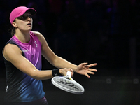 RIYADH, SAUDI ARABIA - NOVEMBER 07: Iga Swiatek of Poland during her match against Daria Kasatkina, on Day 6 of the 2024 WTA Finals, part of...