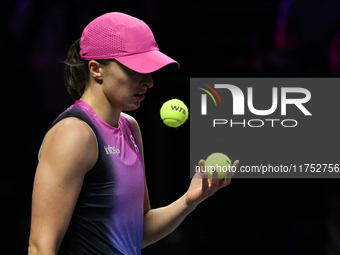 RIYADH, SAUDI ARABIA - NOVEMBER 07: Iga Swiatek of Poland during her match against Daria Kasatkina, on Day 6 of the 2024 WTA Finals, part of...