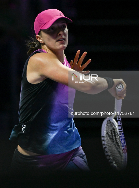 RIYADH, SAUDI ARABIA - NOVEMBER 07: Iga Swiatek of Poland during her match against Daria Kasatkina, on Day 6 of the 2024 WTA Finals, part of...