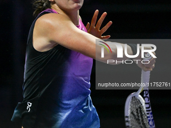 RIYADH, SAUDI ARABIA - NOVEMBER 07: Iga Swiatek of Poland during her match against Daria Kasatkina, on Day 6 of the 2024 WTA Finals, part of...