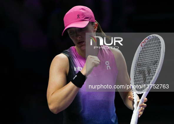 RIYADH, SAUDI ARABIA - NOVEMBER 07: Iga Swiatek of Poland during her match against Daria Kasatkina, on Day 6 of the 2024 WTA Finals, part of...