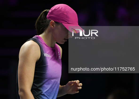 RIYADH, SAUDI ARABIA - NOVEMBER 07: Iga Swiatek of Poland during her match against Daria Kasatkina, on Day 6 of the 2024 WTA Finals, part of...