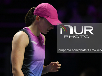 RIYADH, SAUDI ARABIA - NOVEMBER 07: Iga Swiatek of Poland during her match against Daria Kasatkina, on Day 6 of the 2024 WTA Finals, part of...