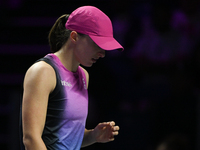 RIYADH, SAUDI ARABIA - NOVEMBER 07: Iga Swiatek of Poland during her match against Daria Kasatkina, on Day 6 of the 2024 WTA Finals, part of...