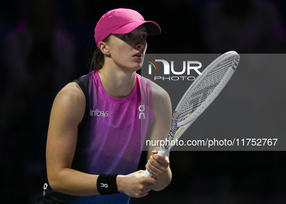 RIYADH, SAUDI ARABIA - NOVEMBER 07: Iga Swiatek of Poland during her match against Daria Kasatkina, on Day 6 of the 2024 WTA Finals, part of...